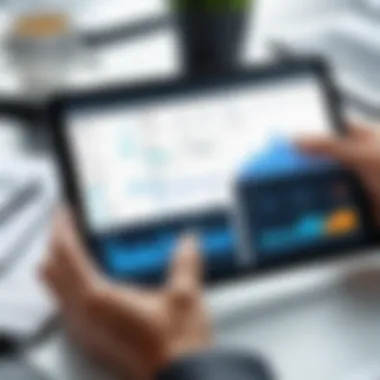 Sales Data Analysis on Tablet Business owner analyzing sales data on a tablet