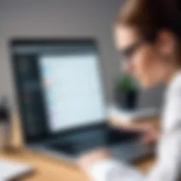 A visually impaired person using a screen reader on a laptop.